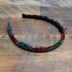 Elegant Feathered Headband with Red and Blue Highlights